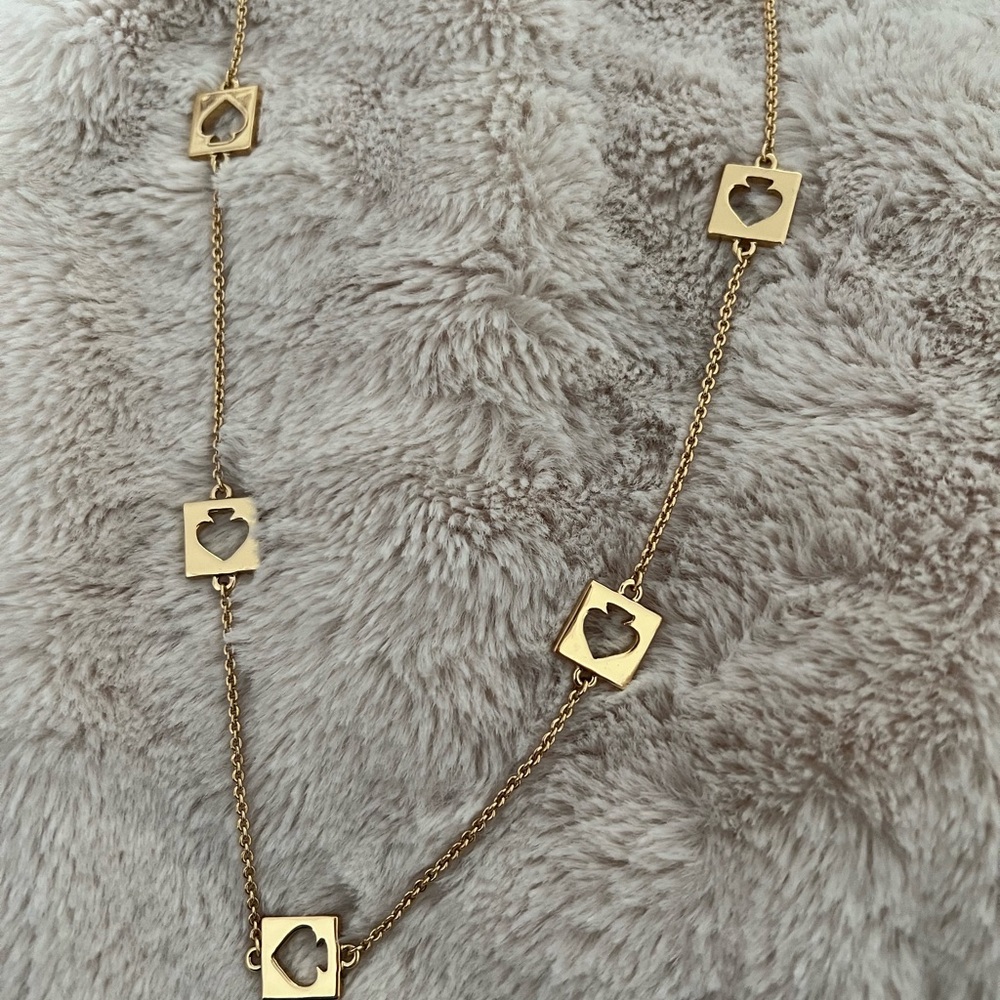 kate spade hole punch spade necklace in gold with original dust bag NWT